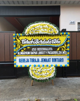 Papan Bunga Duka di Surya Bahari